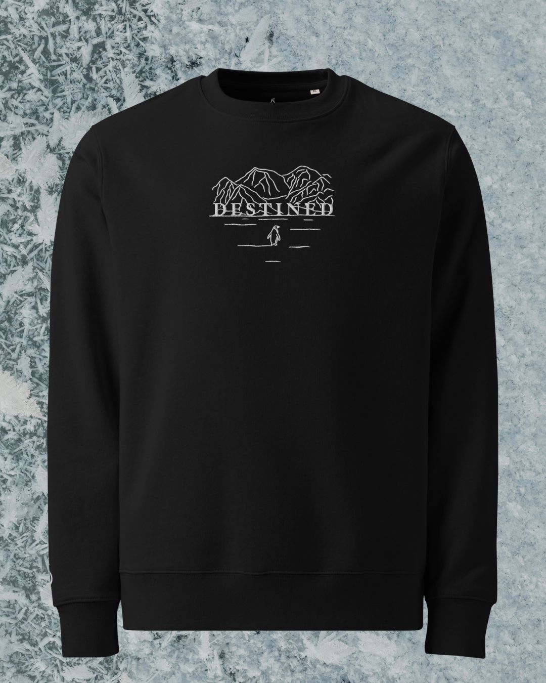 DESTINED Premium Sweatshirt Polar Night mit weißer Bergmotiv-Stickerei – Frontansicht auf Eiskristall-Hintergrund
